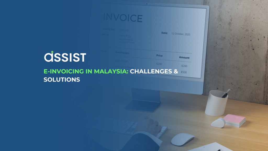 Businessman reviewing an e-invoice on a computer screen – E-invoicing in Malaysia for digital tax compliance.